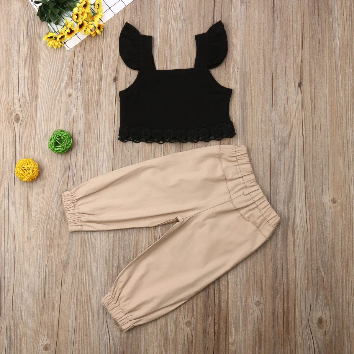 Black Top and Khaki Pants Outfit - Image 2
