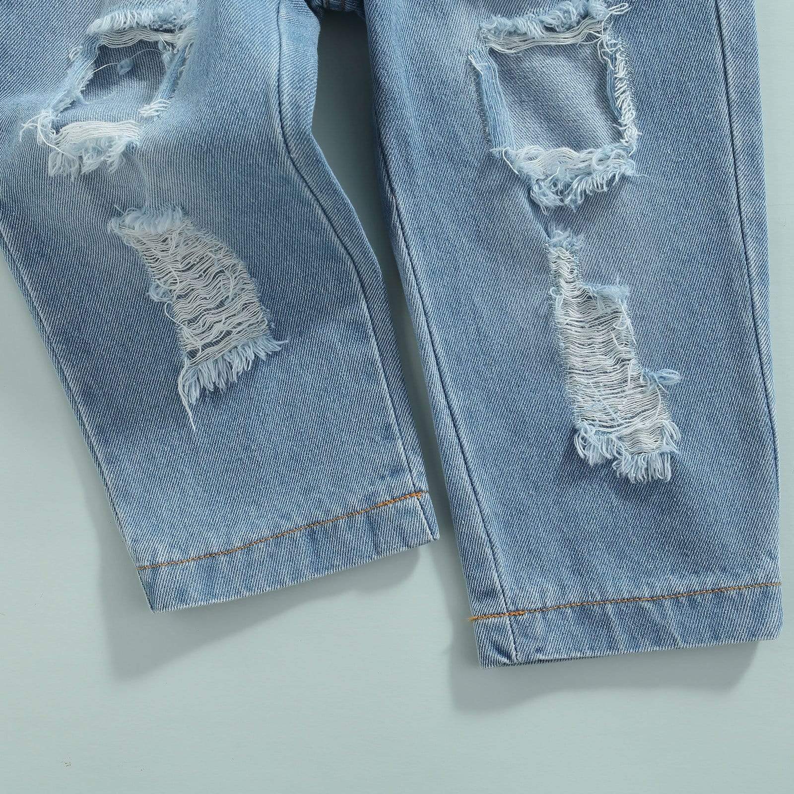 Denim Vest and Ripped Jeans Outfit - Image 5